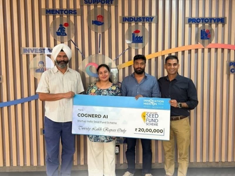 Aman Mundra and Sakshi Dhawan, PhD, holding the ₹20 lakh Startup India Seed Fund Scheme cheque